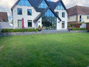 Box hedging along platformed paving